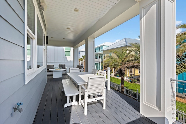 deck with outdoor dining space