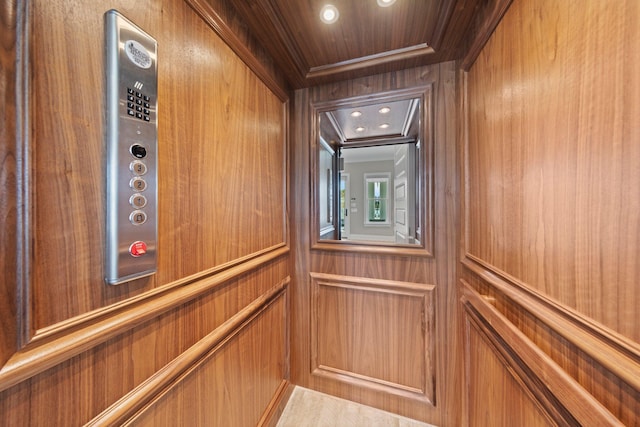 interior details with elevator, crown molding, recessed lighting, and wood ceiling