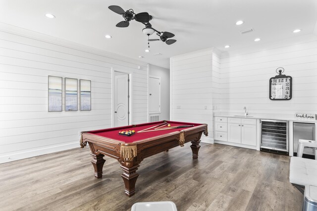 recreation room with pool table, bar area, visible vents, wood finished floors, and beverage cooler