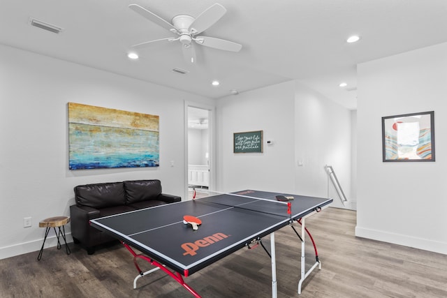 rec room with recessed lighting, visible vents, baseboards, and wood finished floors