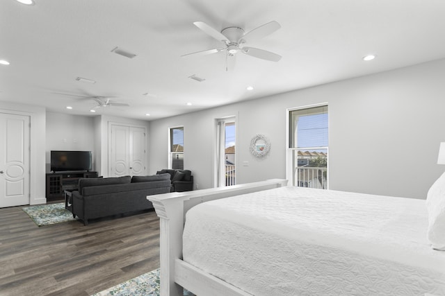 bedroom featuring a ceiling fan, dark wood-style floors, visible vents, and recessed lighting