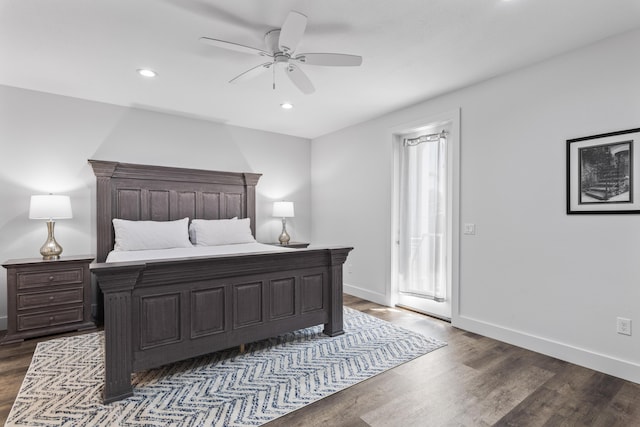 bedroom with baseboards, recessed lighting, ceiling fan, and dark wood finished floors