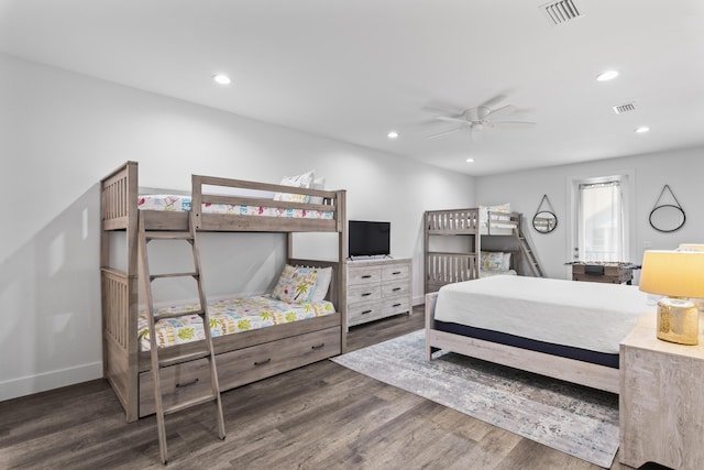 bedroom featuring recessed lighting, visible vents, baseboards, and wood finished floors