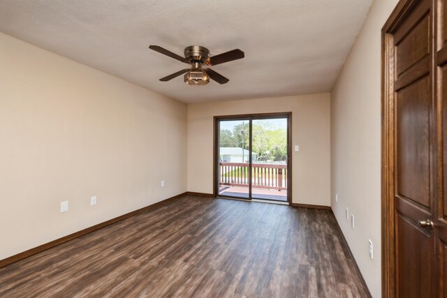 2116 Vizcaya Dr, Navarre, FL 32566 - empty room with a ceiling fan, dark wood-type flooring, and baseboards