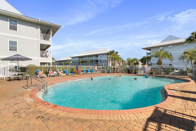 11 Beachside Dr Unit 913, Santa Rosa Beach, FL 32459 - community pool with fence and a patio area