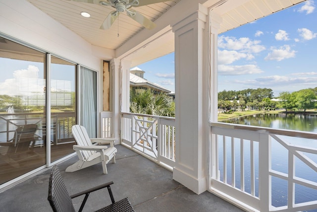 2221 Crystal Cove Ln Unit 2221, Miramar Beach, FL 32550 - balcony with a ceiling fan and a water view