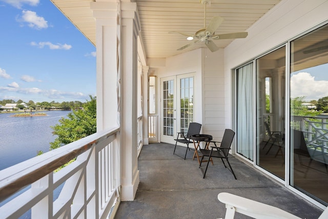 2221 Crystal Cove Ln Unit 2221, Miramar Beach, FL 32550 - balcony featuring french doors, a water view, and a ceiling fan