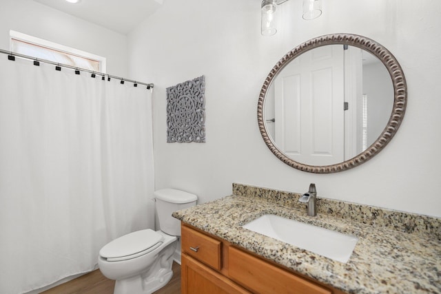 2221 Crystal Cove Ln Unit 2221, Miramar Beach, FL 32550 - full bath featuring vanity, wood finished floors, toilet, and a shower with curtain