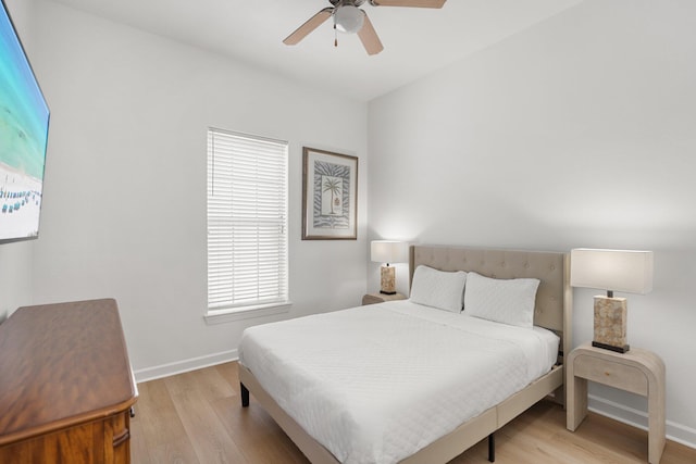 2221 Crystal Cove Ln Unit 2221, Miramar Beach, FL 32550 - bedroom featuring light wood-style floors, baseboards, and a ceiling fan