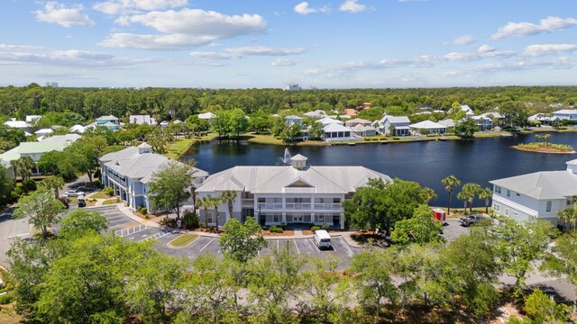 2221 Crystal Cove Ln Unit 2221, Miramar Beach, FL 32550 - aerial view with a water view and a residential view
