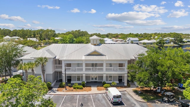 2221 Crystal Cove Ln Unit 2221, Miramar Beach, FL 32550 - view of building exterior with uncovered parking