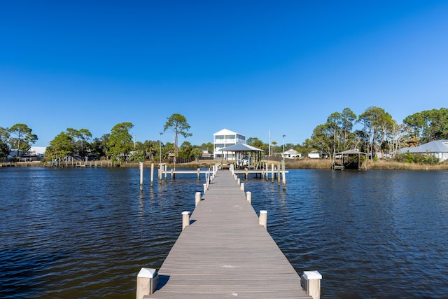8730 Thomas Dr # 1203C, Panama City Beach, FL 32408 - dock area featuring boat lift and a water view