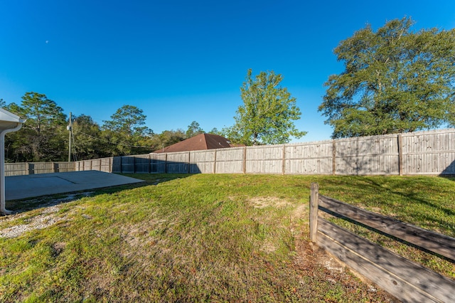 view of yard with fence