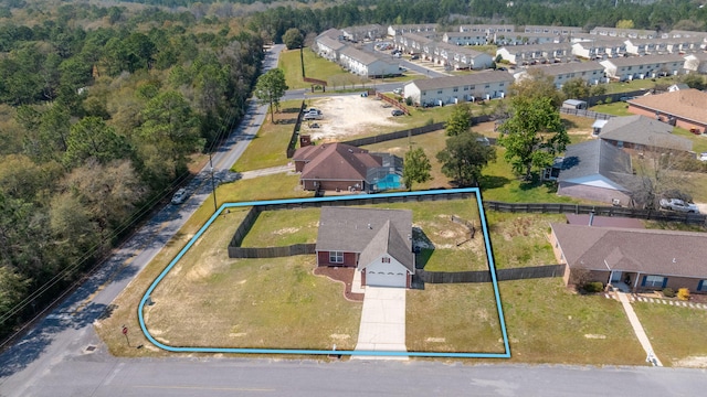 drone / aerial view with a residential view