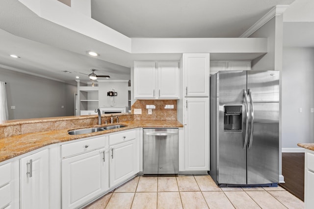 4397 Vardon Way, Niceville, FL 32578 - kitchen with appliances with stainless steel finishes, a sink, light stone counters, white cabinets, and recessed lighting