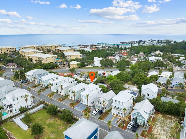 aerial view featuring a residential view and a water view