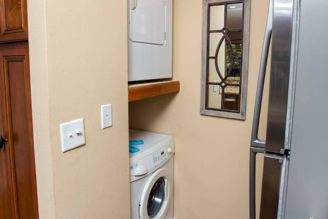 laundry room featuring washer / clothes dryer and laundry area