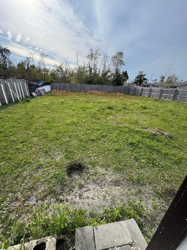 view of yard with fence