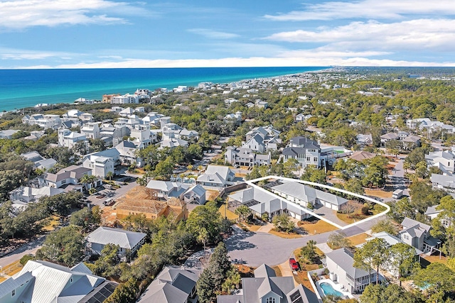 aerial view with a residential view and a water view