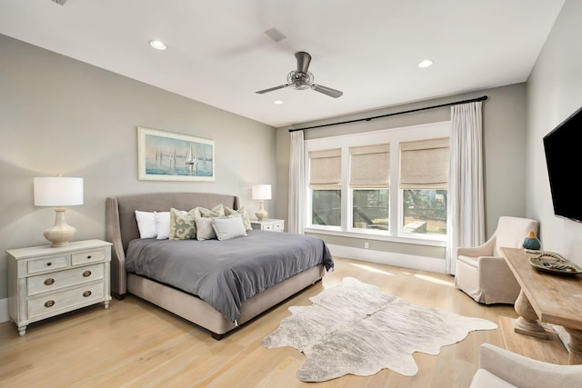 bedroom with light wood-style floors, recessed lighting, and a ceiling fan