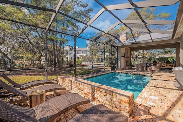 pool with a patio and a lanai