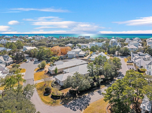 bird's eye view with a water view and a residential view