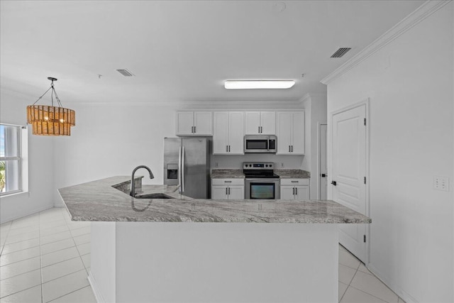 212 Harbor Blvd Unit 205, Destin, FL 32541 - kitchen featuring appliances with stainless steel finishes, a sink, light tile patterned floors, a chandelier, and white cabinets