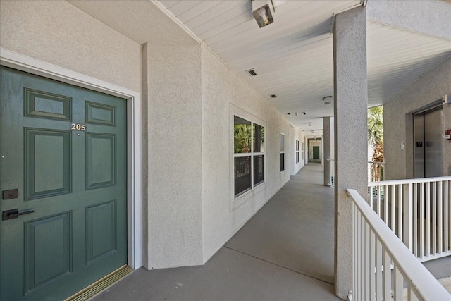 212 Harbor Blvd Unit 205, Destin, FL 32541 - property entrance featuring stucco siding