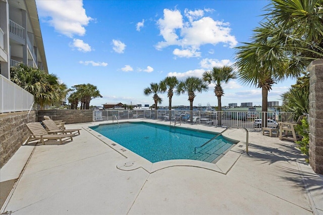 212 Harbor Blvd Unit 205, Destin, FL 32541 - community pool with fence and a patio area