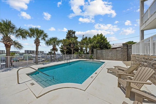212 Harbor Blvd Unit 205, Destin, FL 32541 - community pool with fence and a patio area