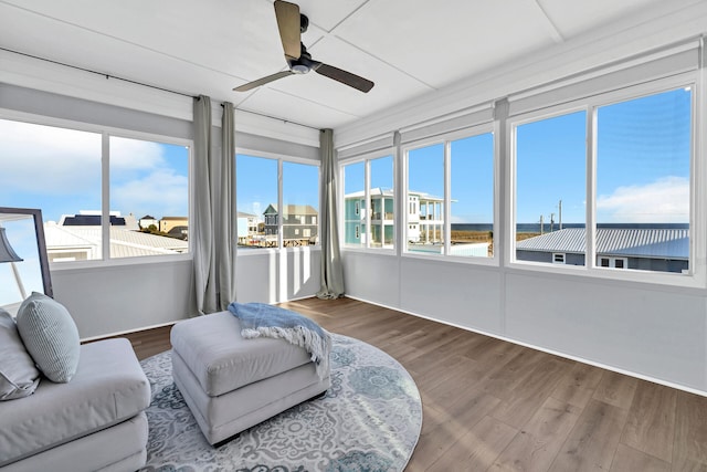 sunroom featuring wood finished floors
