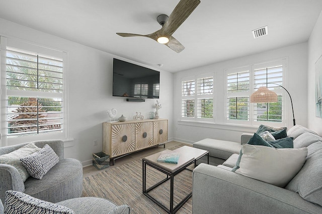 54 Dune Dr, Santa Rosa Beach, FL 32459 - living room featuring baseboards, visible vents, a ceiling fan, and wood finished floors
