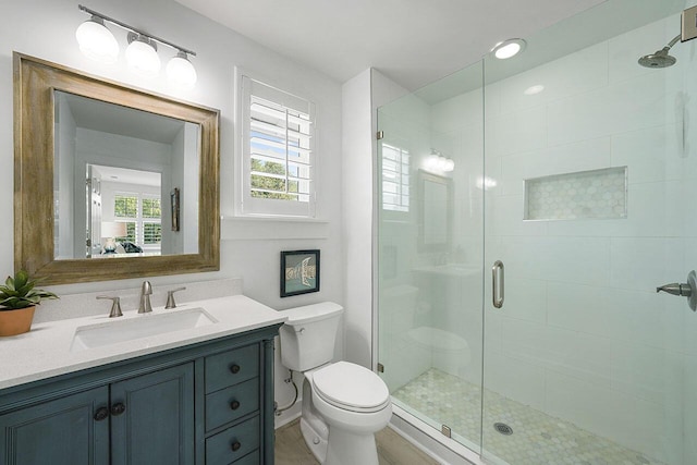 54 Dune Dr, Santa Rosa Beach, FL 32459 - full bath with vanity, toilet, and a shower stall