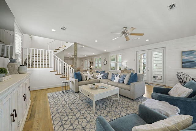 54 Dune Dr, Santa Rosa Beach, FL 32459 - living area with a ceiling fan, visible vents, stairs, and light wood-type flooring