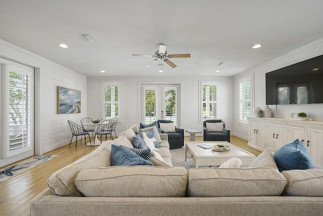 54 Dune Dr, Santa Rosa Beach, FL 32459 - living room with plenty of natural light, visible vents, wood finished floors, and french doors