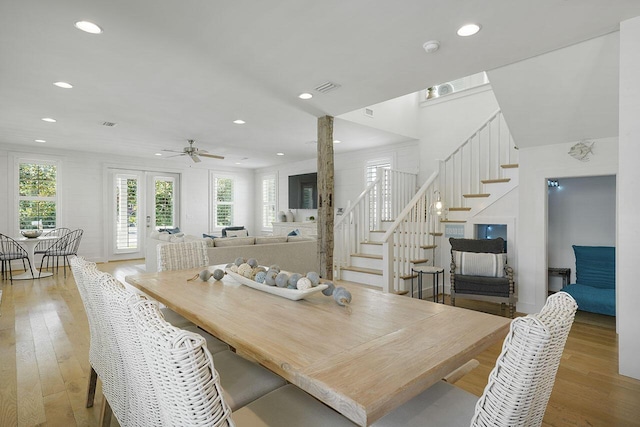 54 Dune Dr, Santa Rosa Beach, FL 32459 - dining room featuring stairs, recessed lighting, wood-type flooring, ceiling fan, and visible vents
