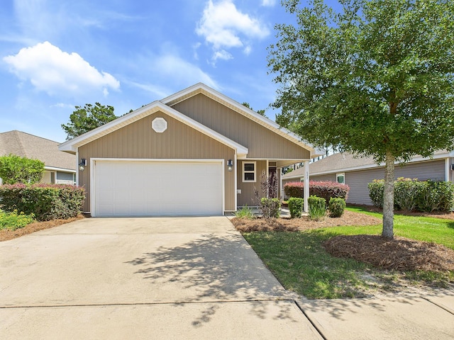 643 Earl Godwin Rd, Freeport, FL 32439 - ranch-style home featuring concrete driveway and a garage