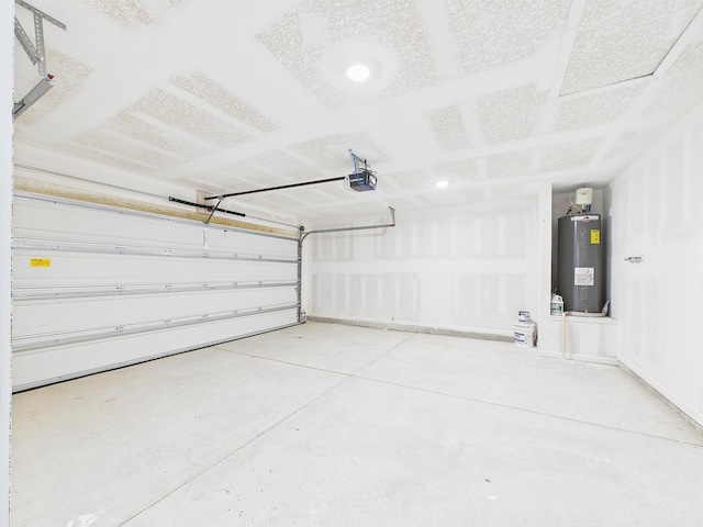 643 Earl Godwin Rd, Freeport, FL 32439 - garage with electric water heater and a garage door opener