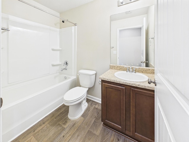 643 Earl Godwin Rd, Freeport, FL 32439 - full bath with wood finished floors, toilet, vanity, and shower / bath combination