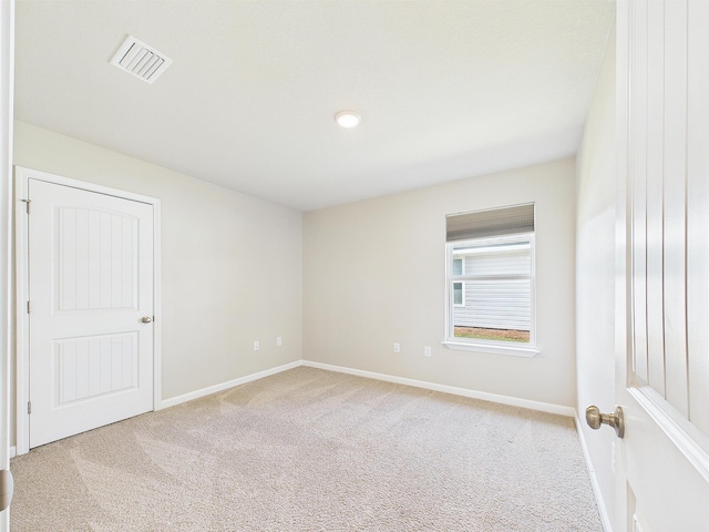 643 Earl Godwin Rd, Freeport, FL 32439 - unfurnished room with light colored carpet and baseboards