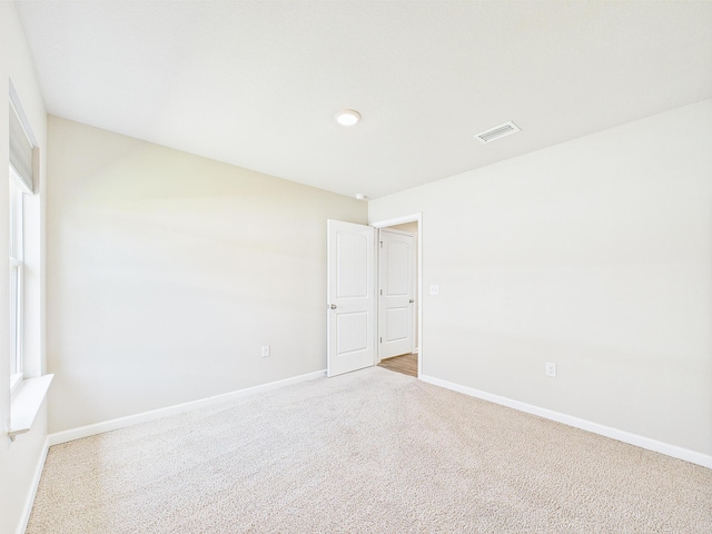 643 Earl Godwin Rd, Freeport, FL 32439 - carpeted empty room featuring baseboards