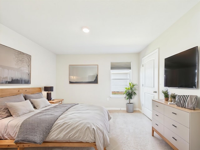 643 Earl Godwin Rd, Freeport, FL 32439 - bedroom with baseboards and light carpet