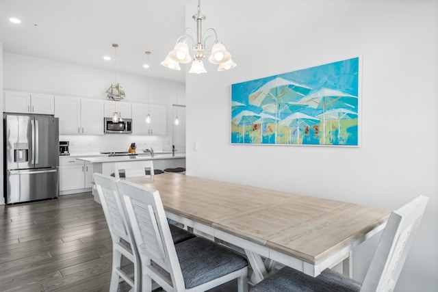 1740 S County Highway 393 # 301, Santa Rosa Beach, FL 32459 - dining room featuring dark wood-style floors, recessed lighting, and an inviting chandelier