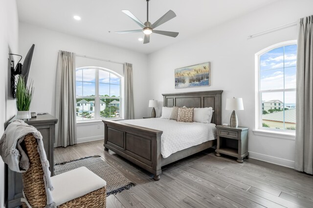 1740 S County Highway 393 # 301, Santa Rosa Beach, FL 32459 - bedroom featuring baseboards, recessed lighting, and light wood-type flooring
