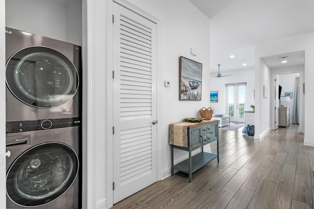 1740 S County Highway 393 # 301, Santa Rosa Beach, FL 32459 - laundry area featuring stacked washer and clothes dryer, baseboards, a ceiling fan, laundry area, and wood finished floors