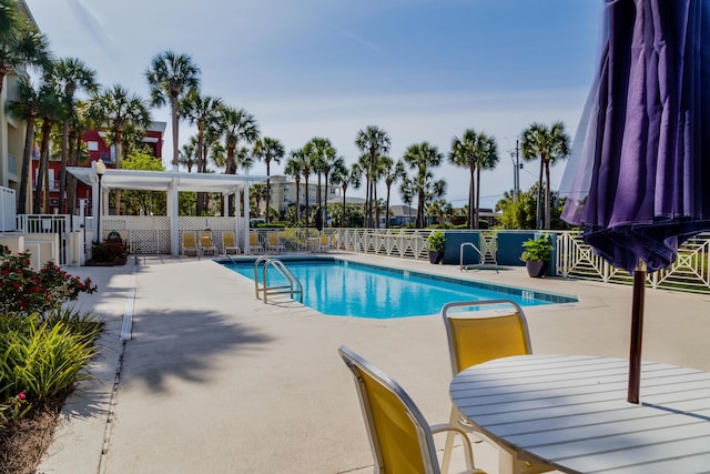 1740 S County Highway 393 # 301, Santa Rosa Beach, FL 32459 - community pool with fence and a patio area