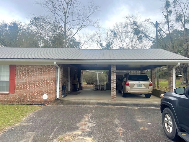 2374 County Highway 280a, Defuniak Springs, FL 32435 - view of parking / parking lot with asphalt driveway and a carport