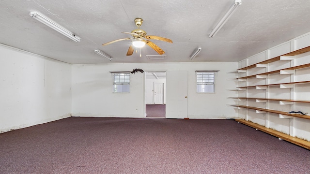 2374 County Highway 280a, Defuniak Springs, FL 32435 - carpeted empty room with healthy amount of natural light, a ceiling fan, and a textured ceiling