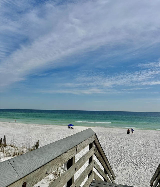 property view of water featuring a beach view