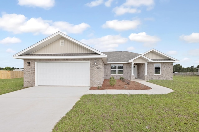 3202 Liz Ct, Crestview, FL 32539 - view of front of house featuring brick siding, concrete driveway, and a garage